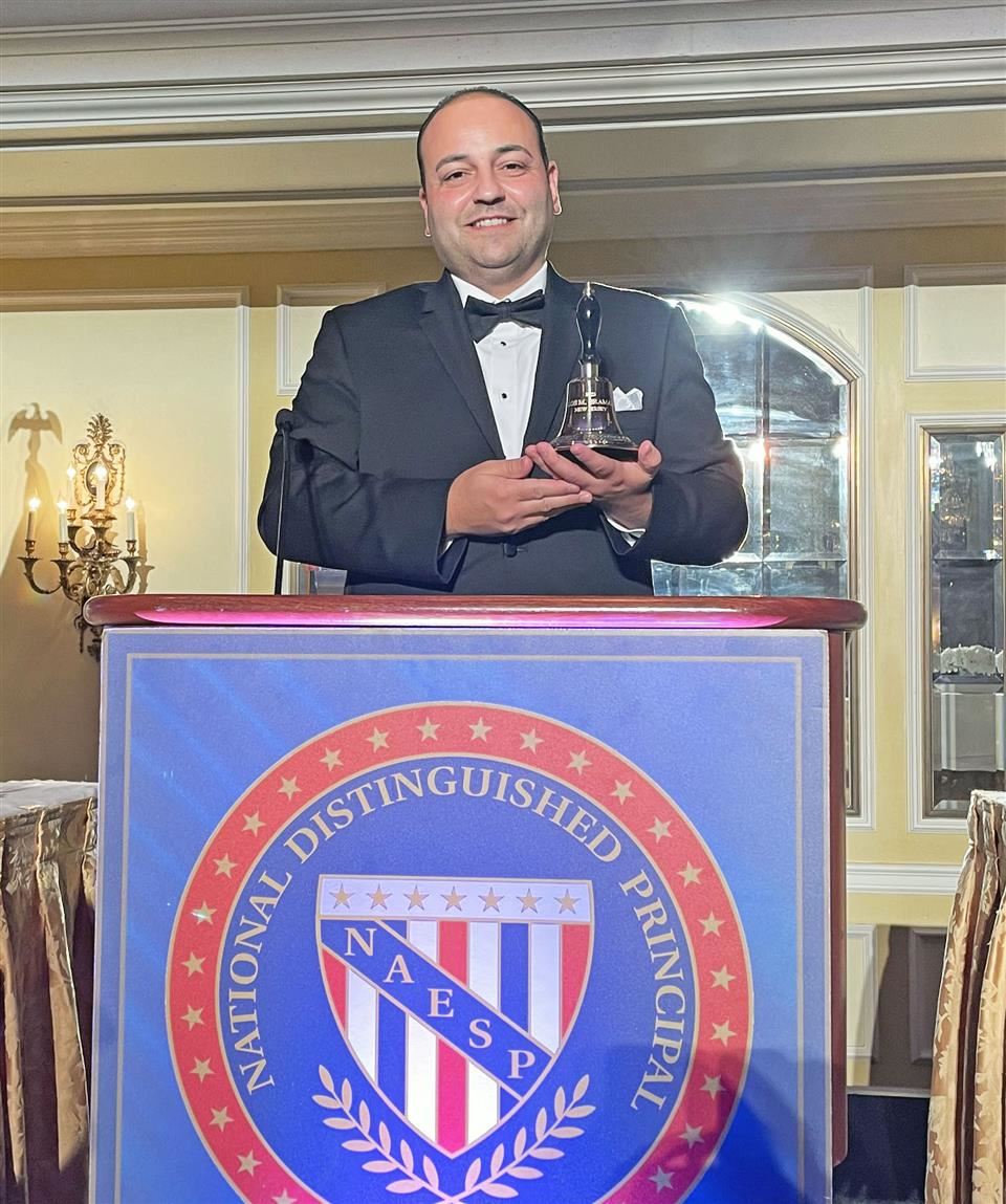 carlos gramata at the podium